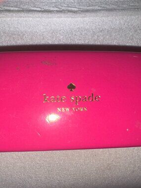 2 designer eyeglasses cases, one is Kate Spade, other Serengeti Driver leather